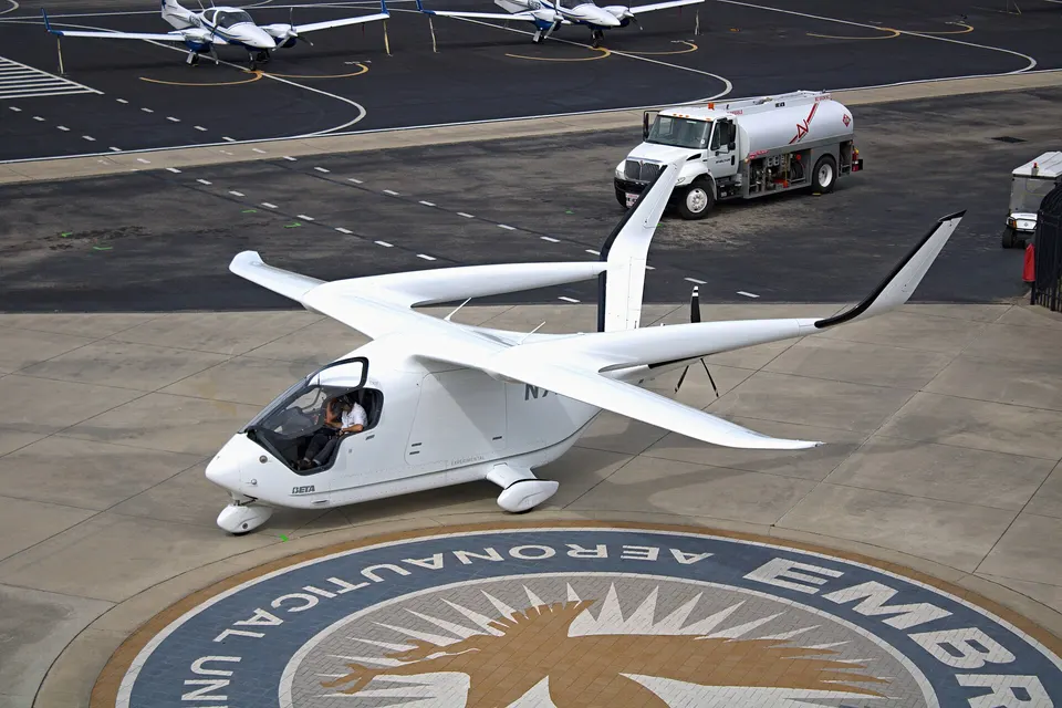 The ALIA CX300 on the ground: a conventional long wing and runway takeoff, pushed by one battery-powered propeller at the tail