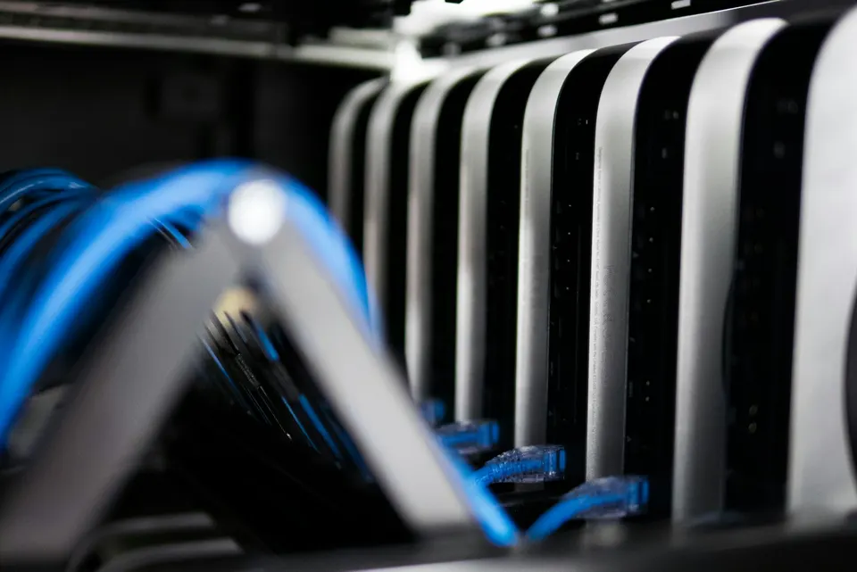 Networked servers in a rack: Base's sequencer orders and runs transactions on servers like these, then posts batches to Ethereum