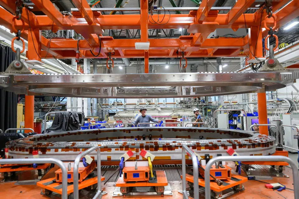 A ring-shaped superconducting coil being assembled at CFS's magnet factory in Devens, which builds SPARC's magnets