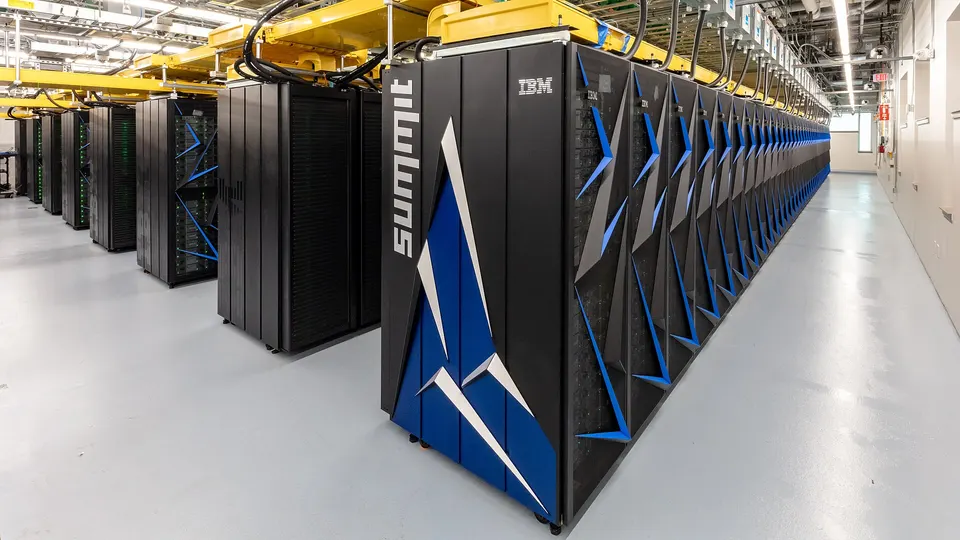 Rows of NVIDIA-GPU racks in Summit, an Oak Ridge supercomputer, not a CoreWeave site: the kind of hall a GPU cloud rents out by the machine