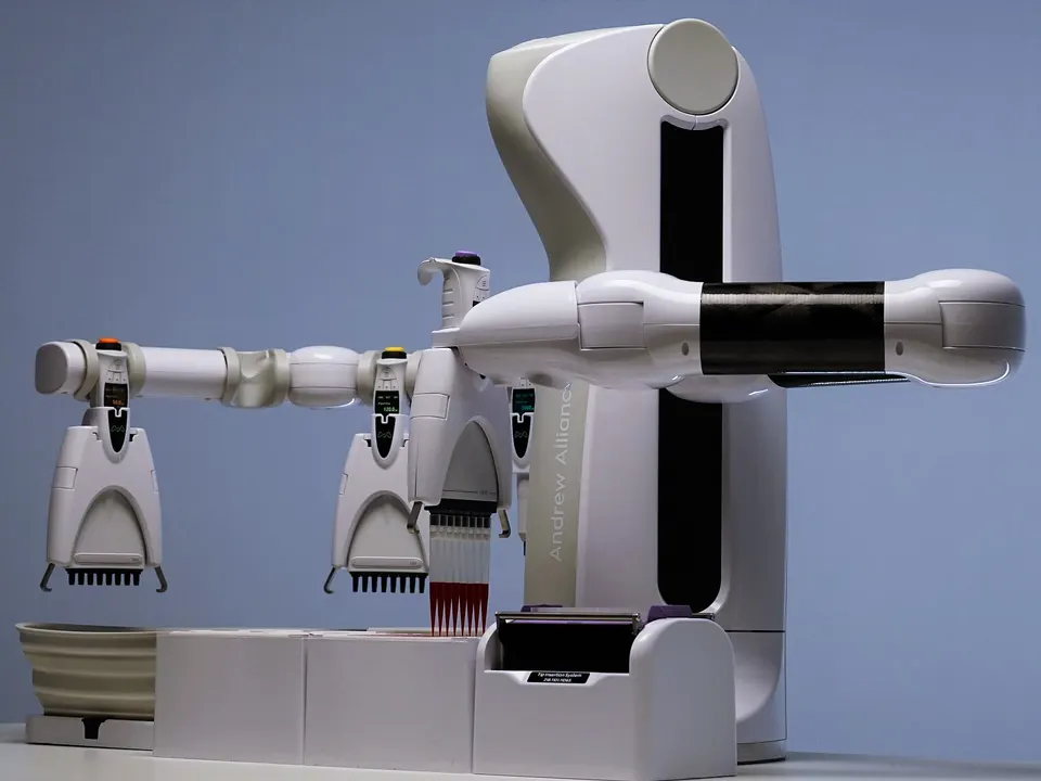 A pipetting robot (Andrew+): the kind of lab automation that turns an AI-proposed experiment into a physical test