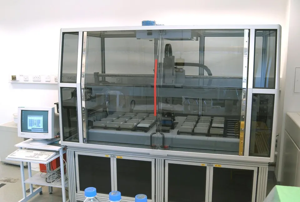 A liquid-handling robot at the Sanger Institute: the kind of automated lab machine Ginkgo's robot carts link together