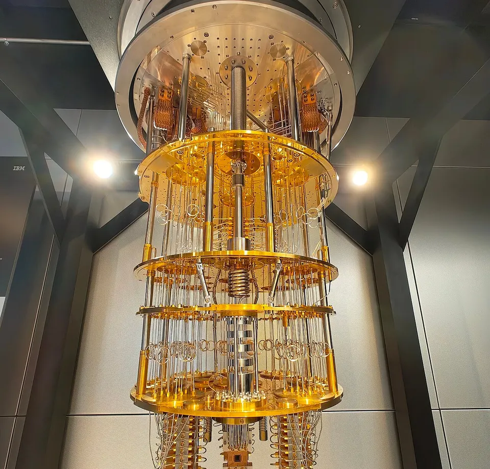 Inside an IBM Quantum System One, not Starling: each gold stage is colder than the one above, down to about 10 mK where the chip sits