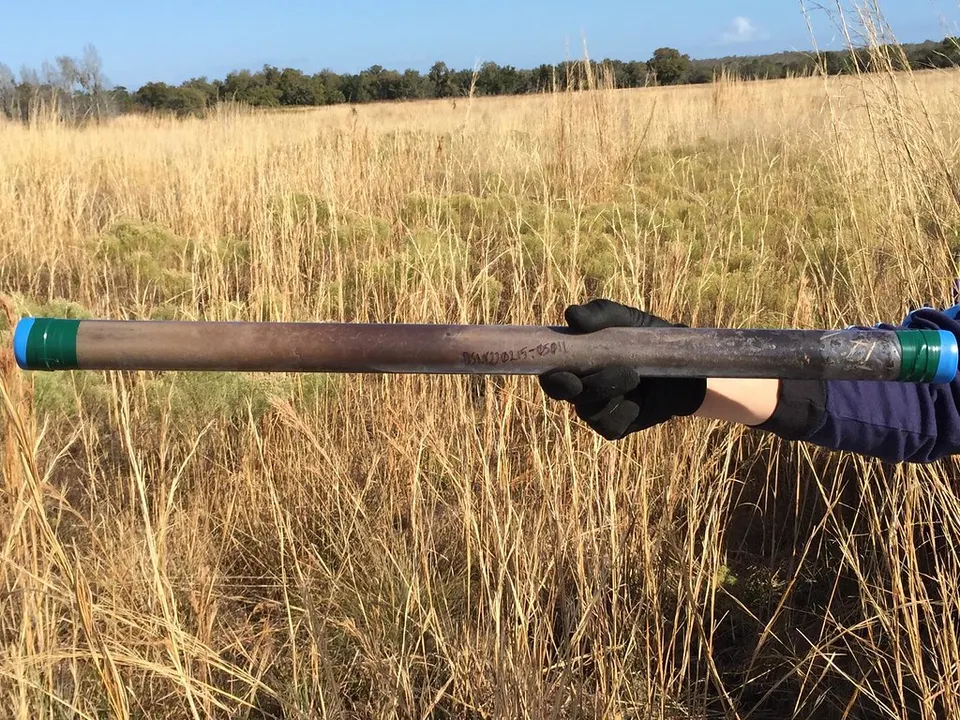 A soil core pulled from a field: measured samples like this, plus models, are how soil-carbon changes are estimated