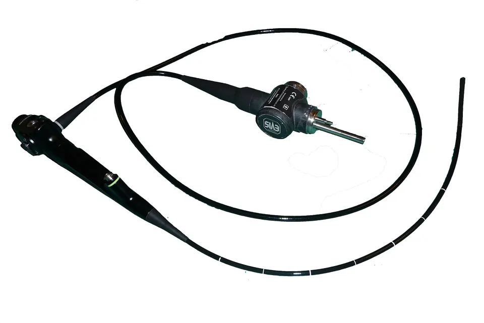 A manual flexible bronchoscope, the tool Ion replaces: Ion's robot-steered catheter is thinner (3.5 mm) and can bend 180° to reach deep airways