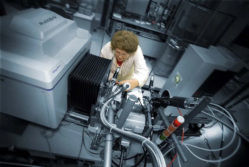 Mounting a protein crystal for X-ray analysis: the kind of lab measurement that checks AI-designed drugs and trains the models