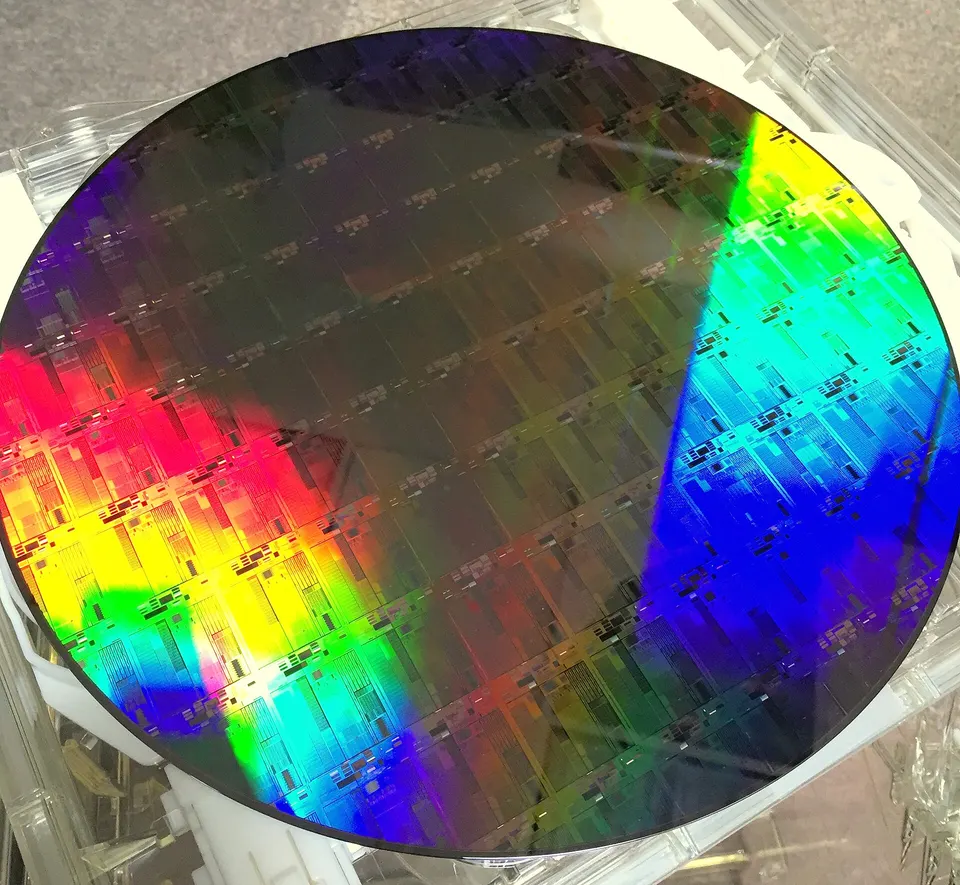 A 300 mm silicon photonics wafer, not Lightmatter's: Passage is made the same way, with light guides etched into silicon like chip wiring