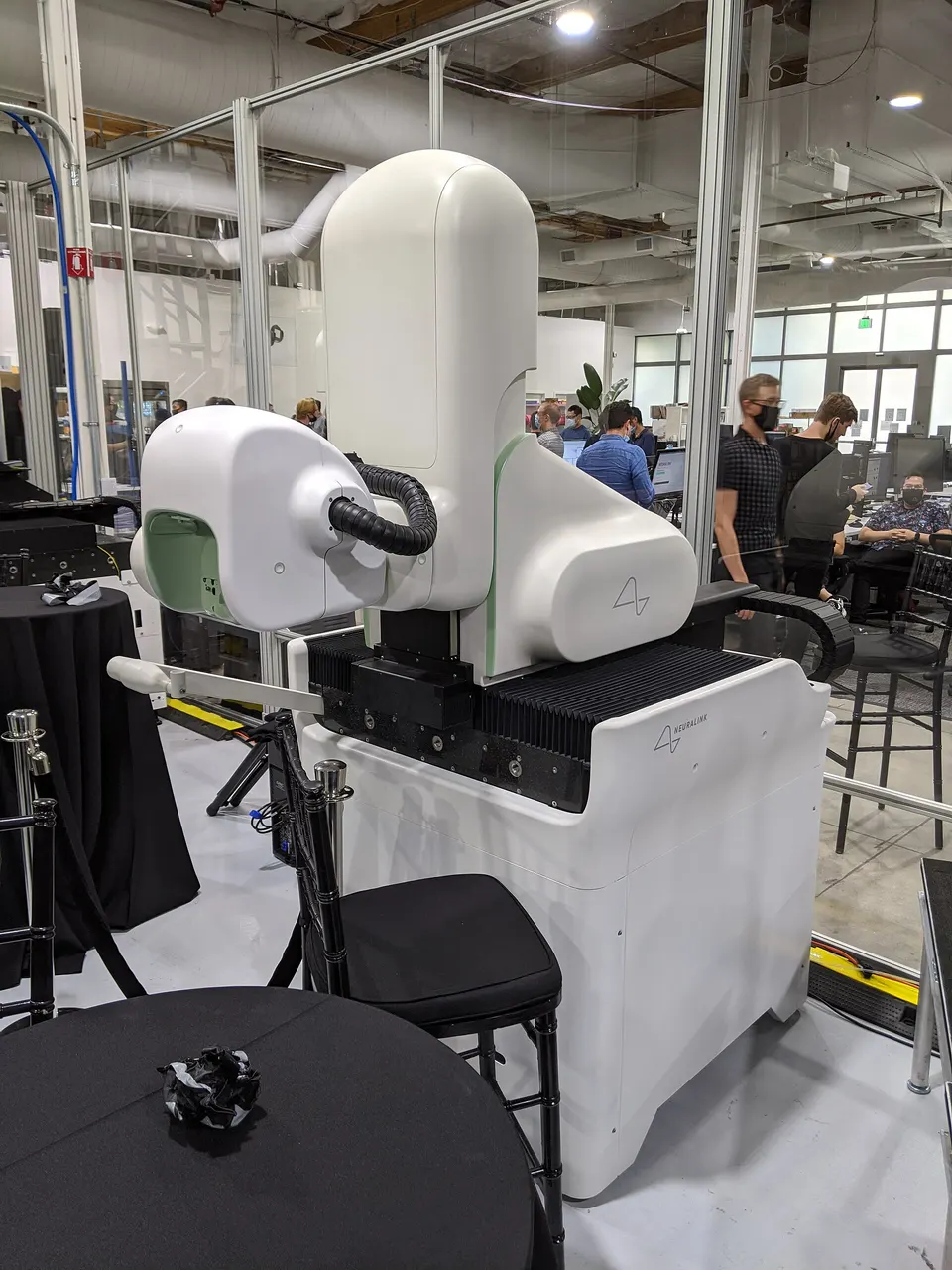 Neuralink's R1 surgical robot, which threads the implant's hair-thin electrodes into the brain while dodging blood vessels