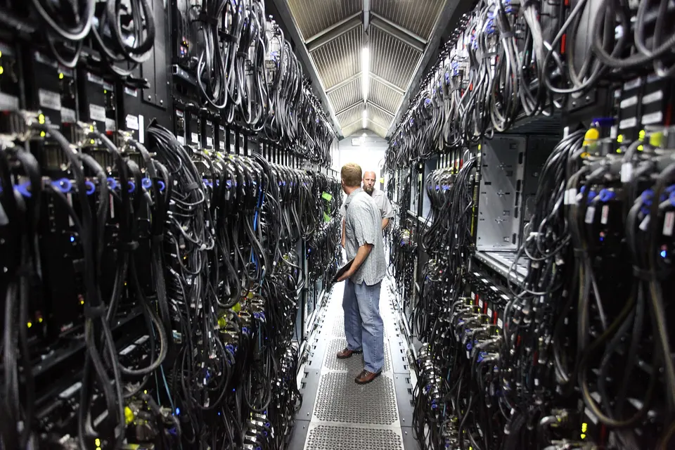 Server aisle in a Microsoft data centre: each Codex cloud task runs in its own sandbox on servers like these