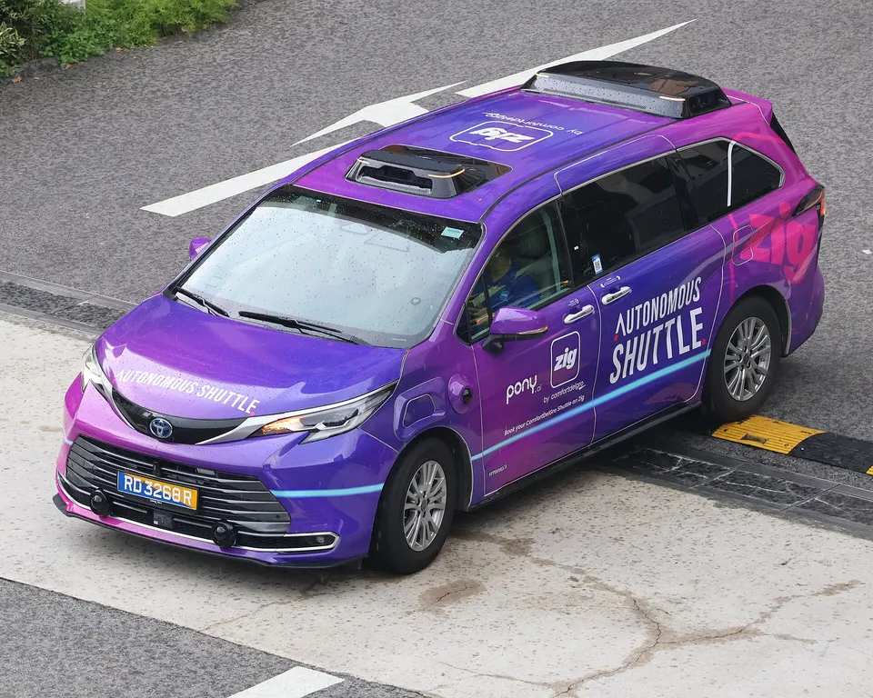 A Pony.ai-driven Toyota Sienna shuttle in Singapore from above: lidars, cameras and radars on the roof; Gen-7 cars carry a cheaper kit