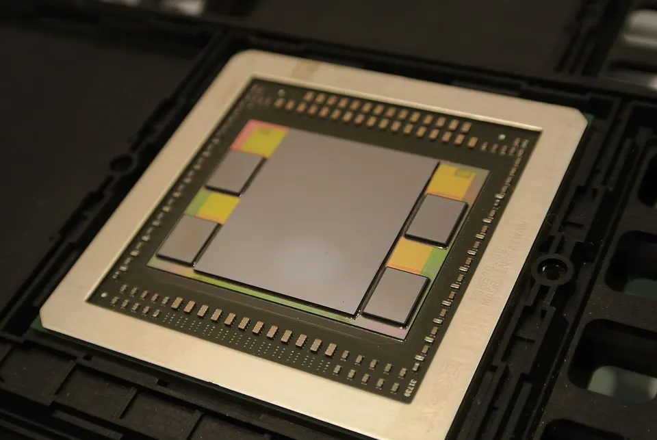 AMD's Fiji GPU (2015) with four first-generation SK hynix HBM stacks beside it on a silicon interposer; HBM4 stacks sit the same way