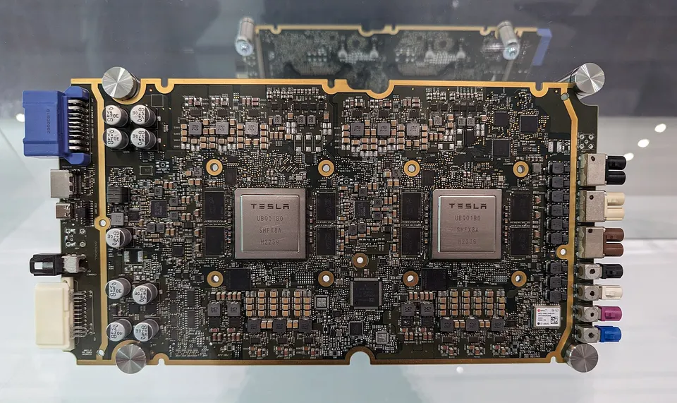 Tesla's HW3 self-driving computer: two Tesla-made chips run the driving network. Robotaxis run its successor, AI4